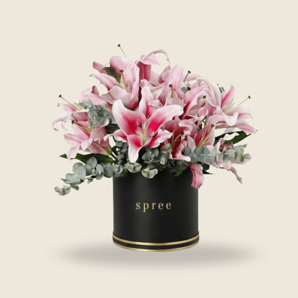 pink lily anniversary flower arrangement in white box