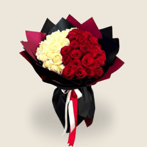 Bouquet of red and white roses wrapped in black and burgundy