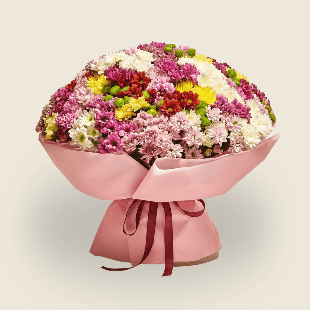 Bright and colorful chrysanthemum bouquet in pink wrapping