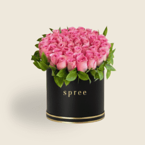 Elegant hatbox of pink roses with green accents for birthdays and anniversaries