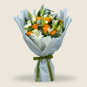 Elegant bouquet of white lilies and orange roses wrapped in grey and white paper