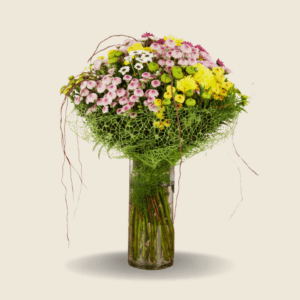 Vase arrangement with mixed chrysanthemums and rustic greens